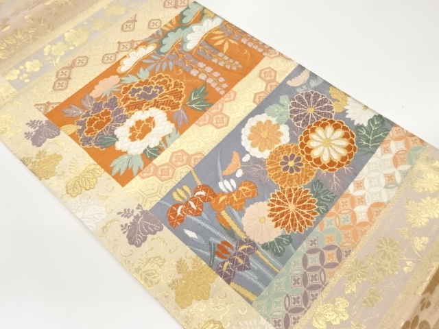 横段に花々・松模様織出し袋帯